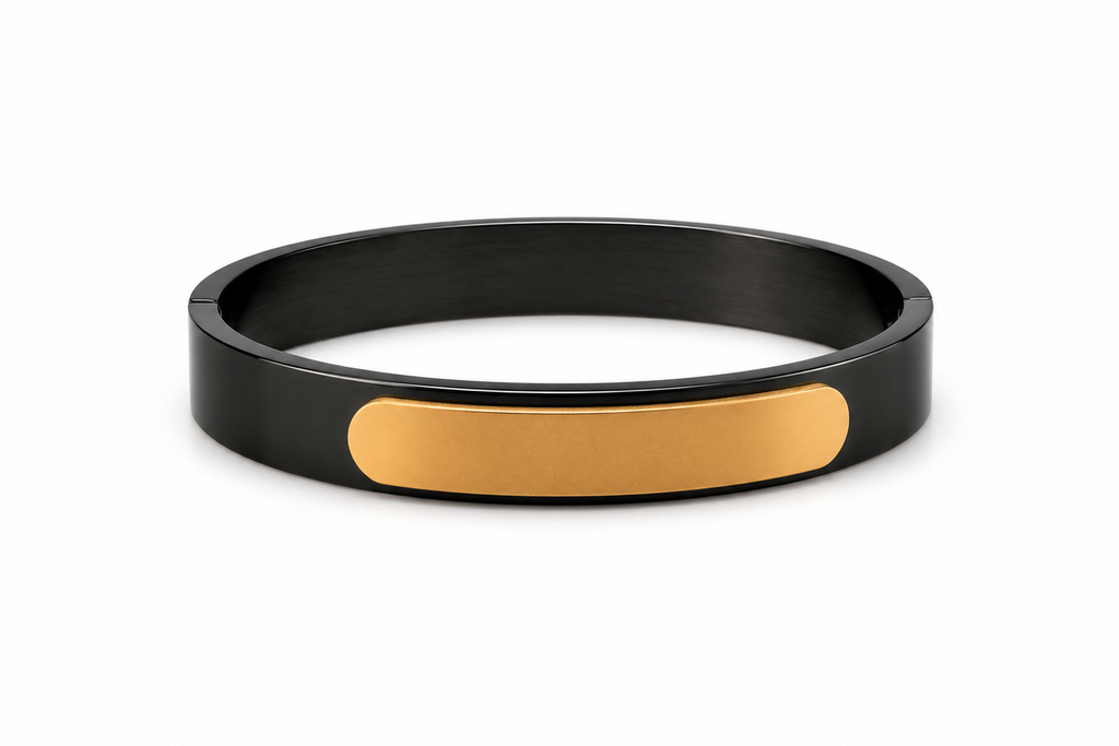 Black and gold bracelet on a white background