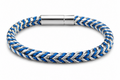 Bracelet with blue and silver braided design on a white background